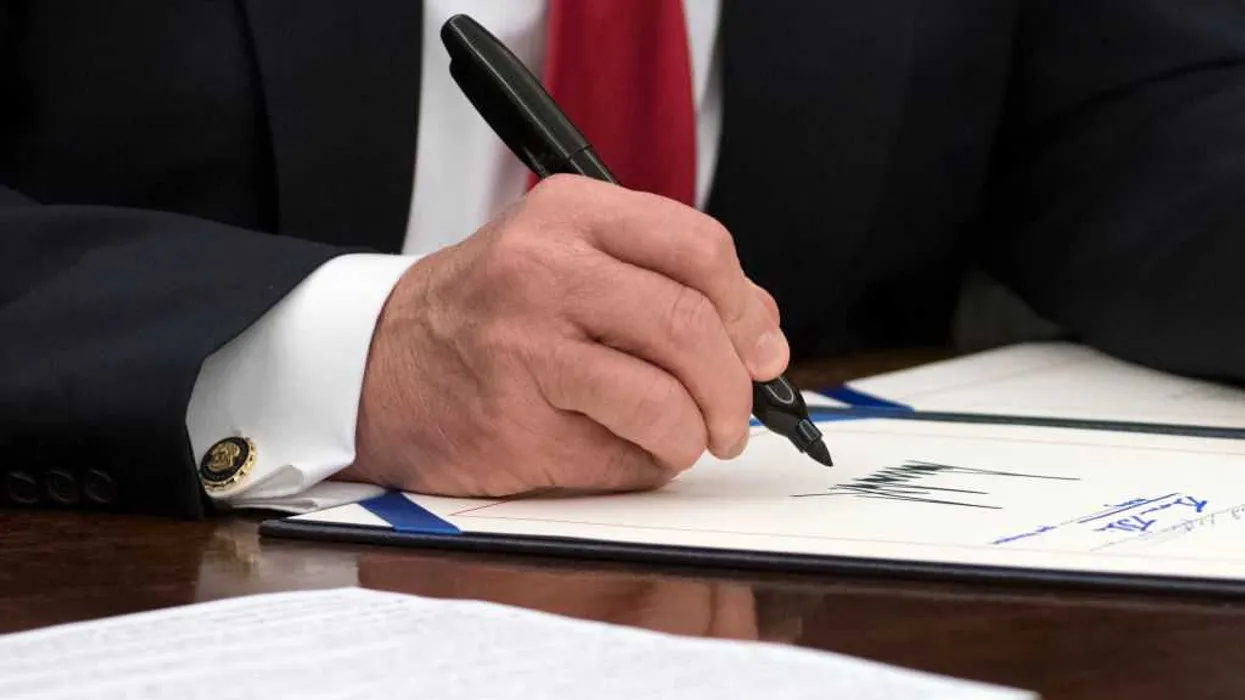 president-signing-a-bill-into-law